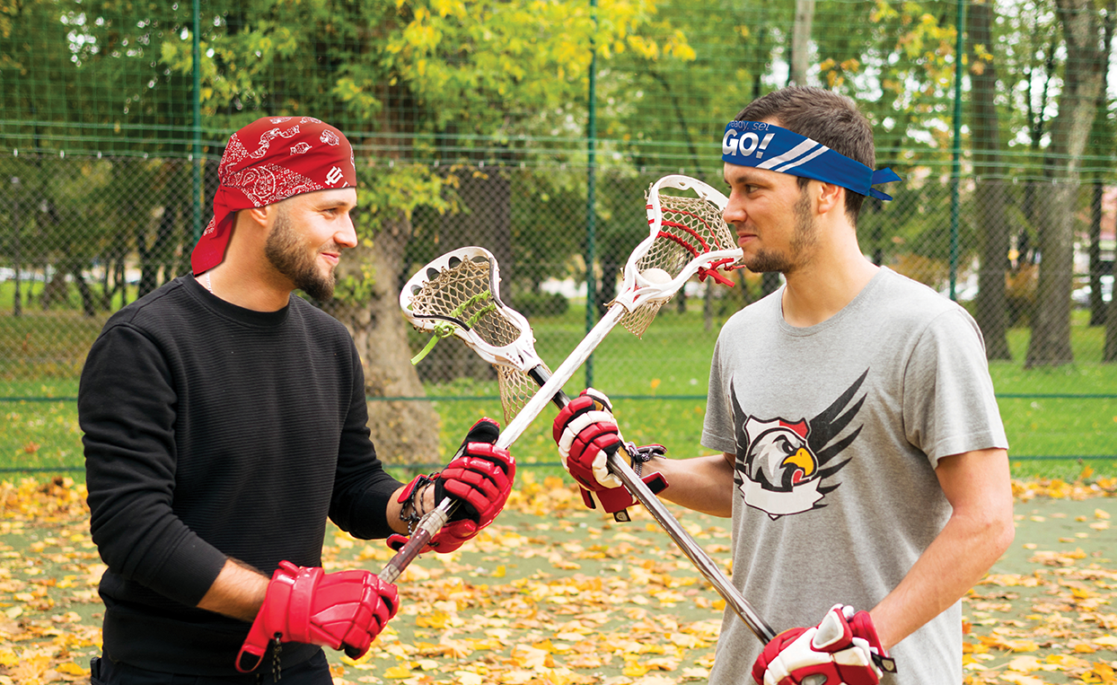 Two lacrosse players with bandannas sports hankies